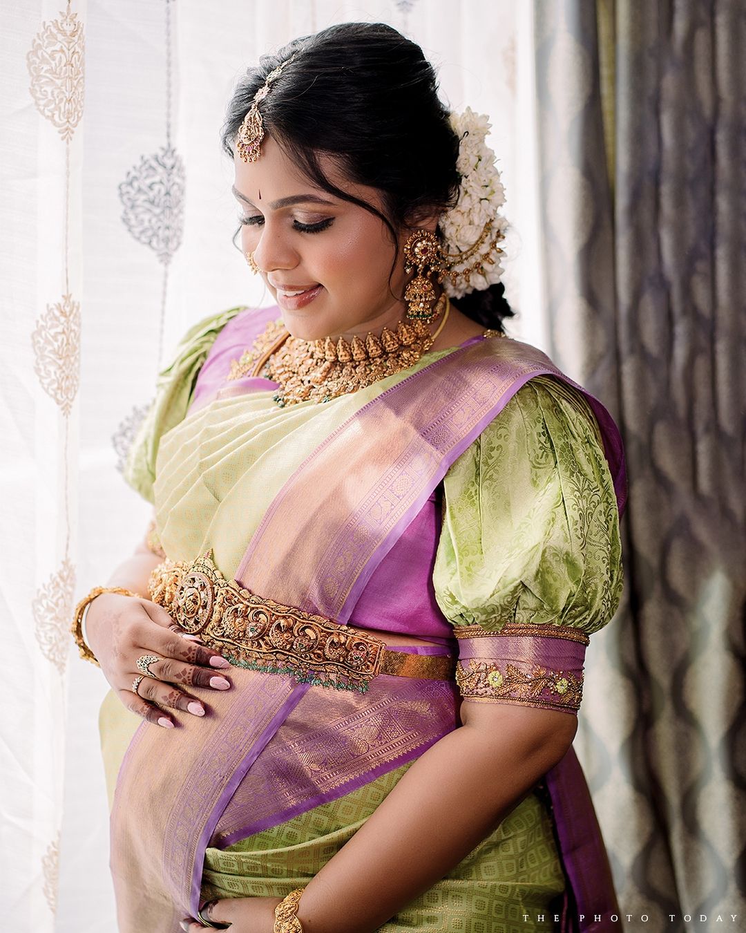 Professional baby shower photoshoot capturing precious moments in Coimbatore.